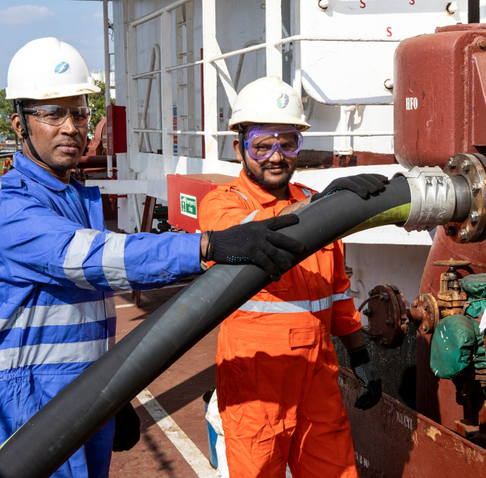 Header - Men working on a ship